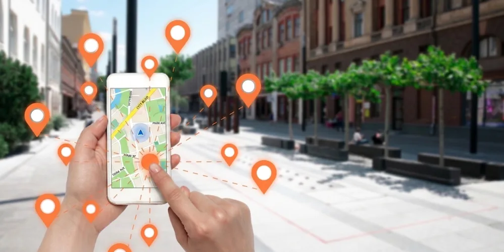 A visitor using a venue navigation app on a smartphone